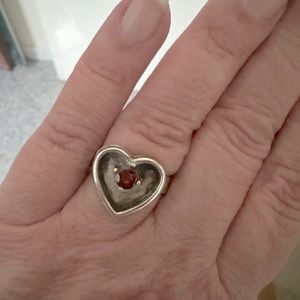 Heart-shaped, genuine, garnet and sterling silver ring.  Size 8.5